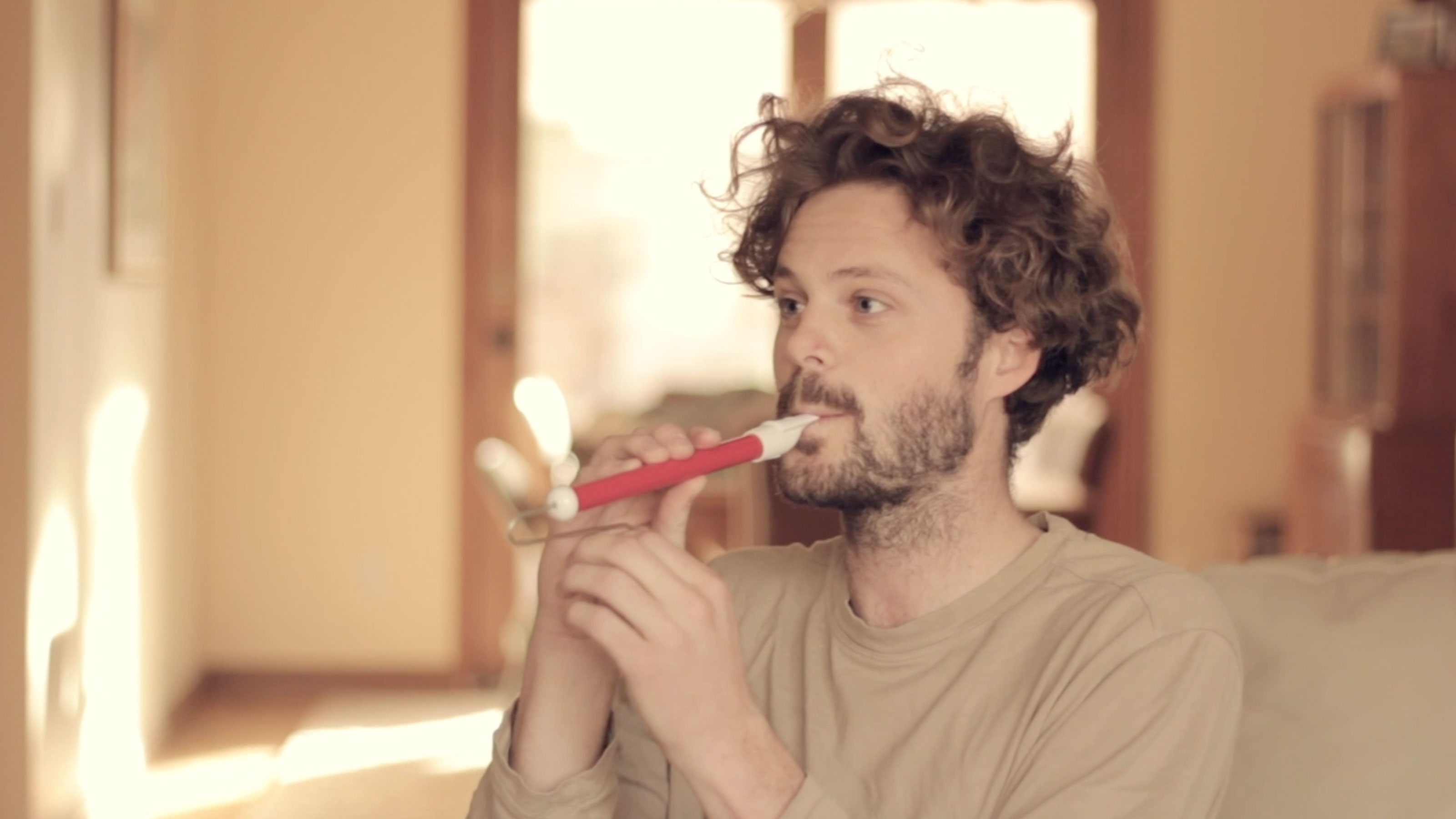 Harbor Bickmore blowing an instrument