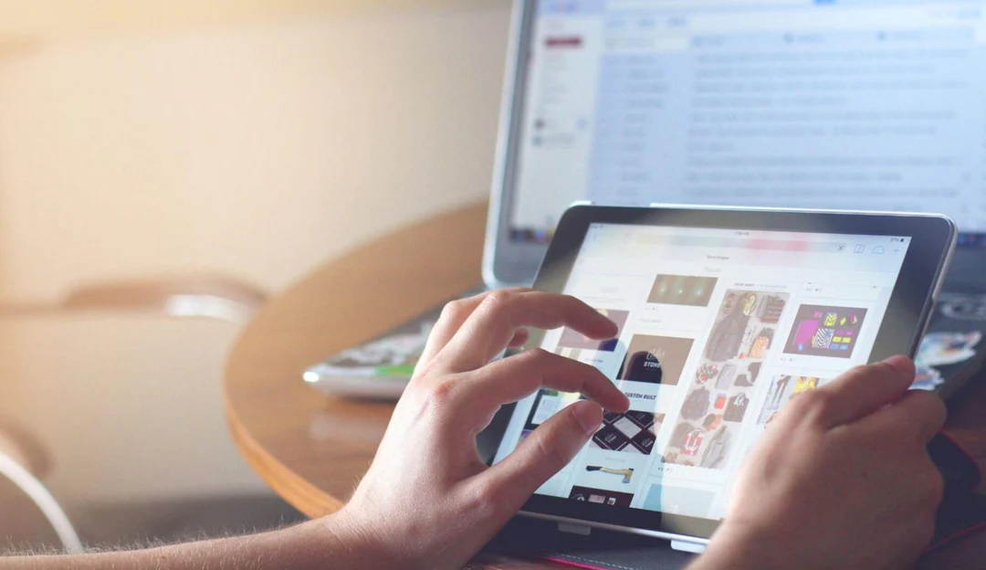 person using a tablet device