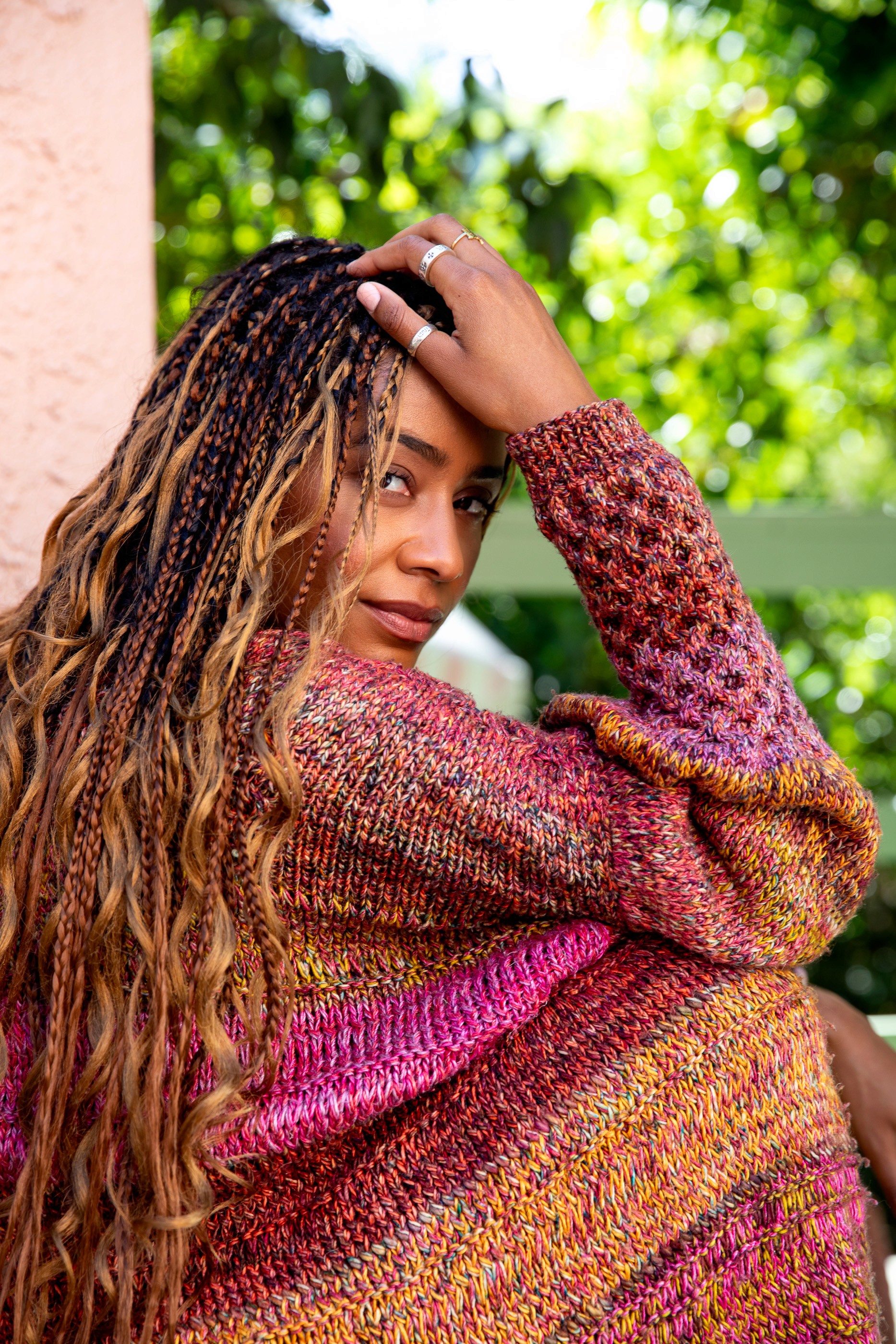 Close-up of a woman's dewy lips and nose with radiant skin, emphasizing natural beauty and glowing complexion.