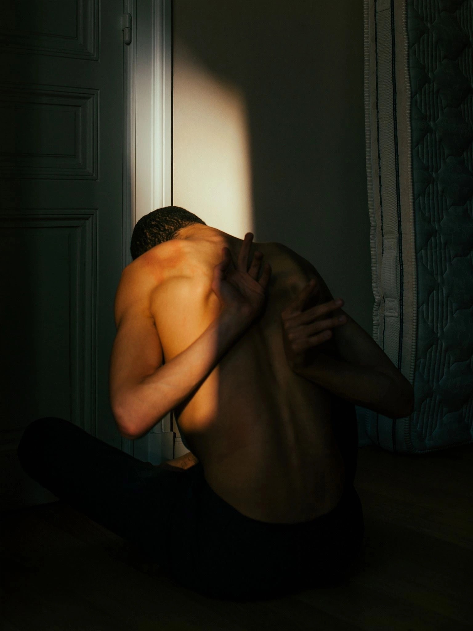 Woman in black dress with orange light effect