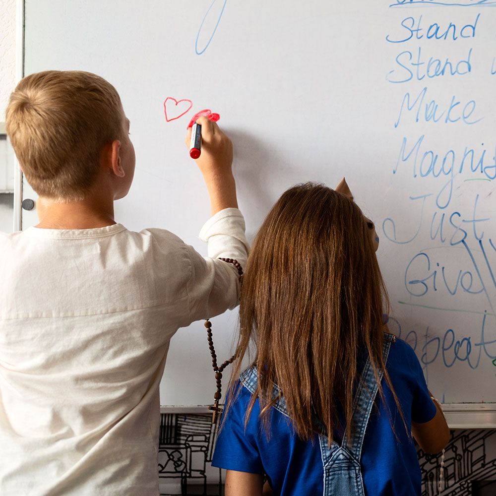 Students learning Spanish vocabulary in interactive after school language enrichment program