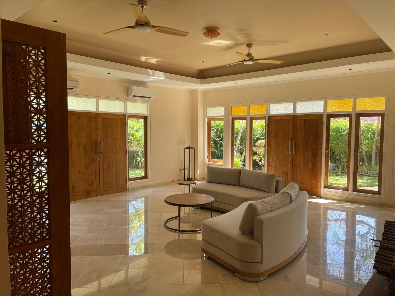 A 4-bedroom villa in a gated complex in Nusa Dua, featuring a large private garden and a peaceful residential environment