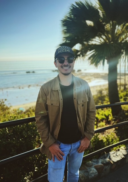 A portrait of a young man smiling