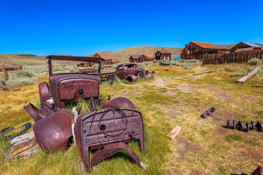 old rusted car on a farm