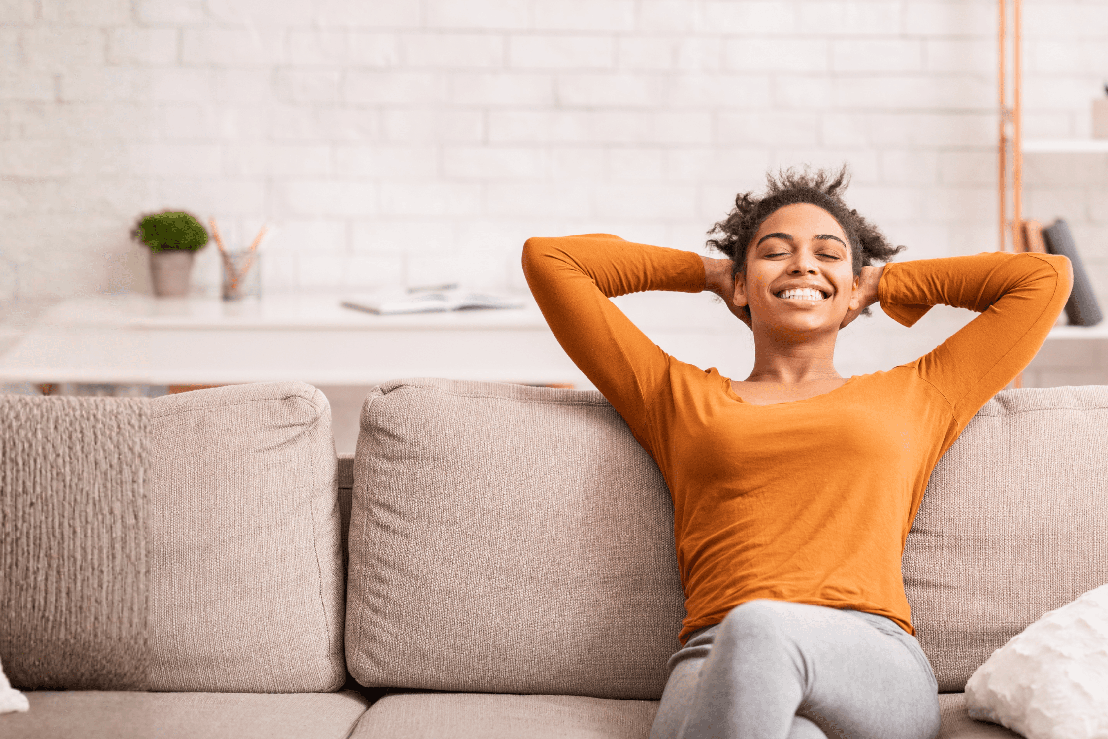 Two diverse teachers smiling together, reinforcing Kina’s mission to **reward families and retain top teachers
