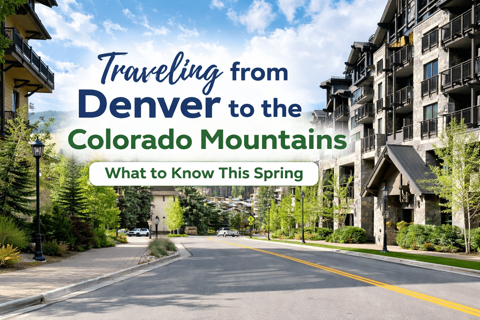 Spring view of a Colorado mountain town with road and resort buildings, representing transportation from Denver to mountain destinations