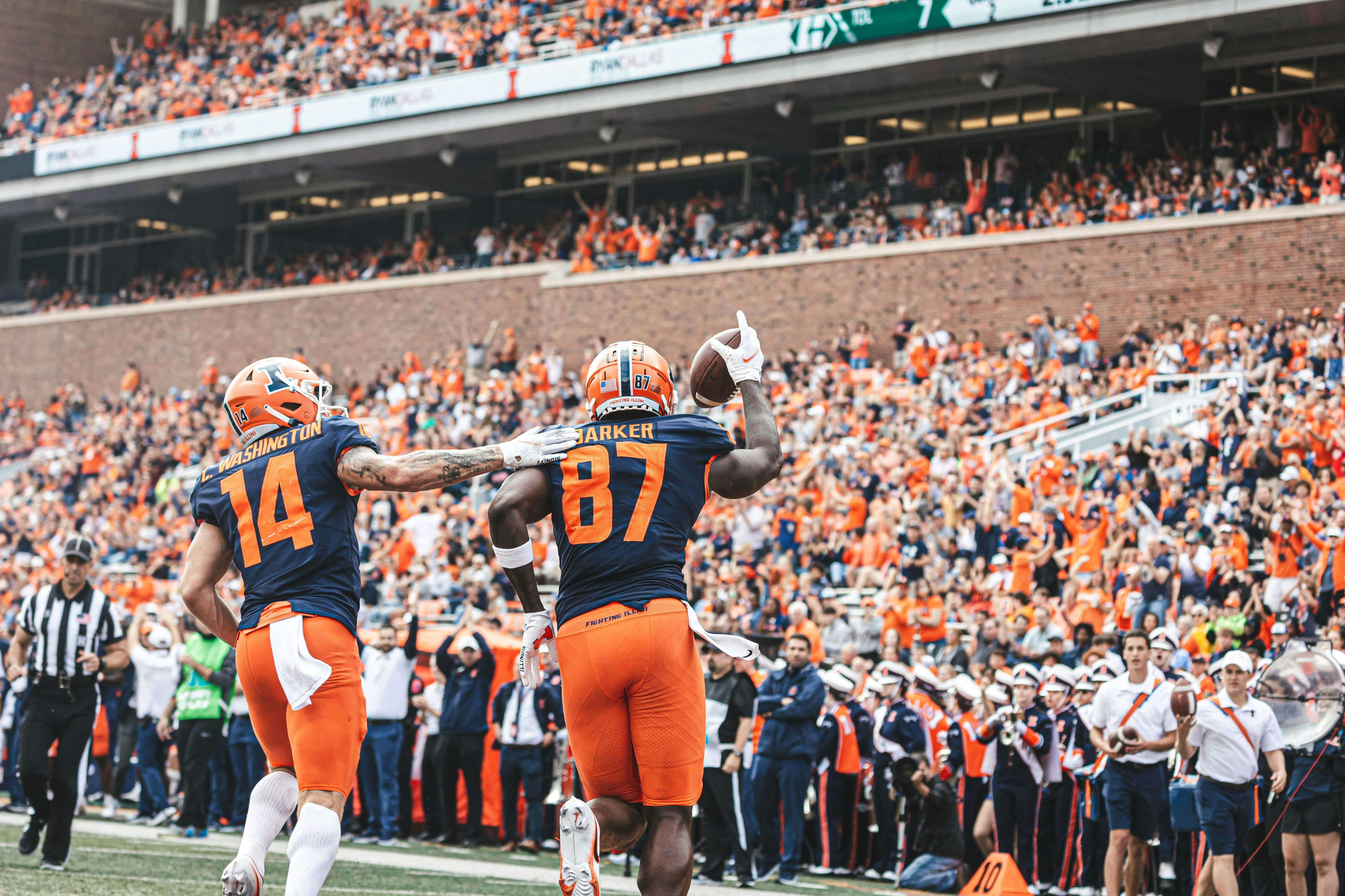 the university of illinois memorial stadium, football game, fans, crowd, players