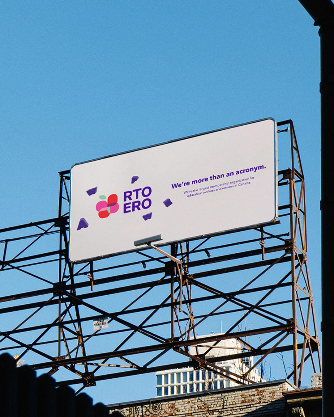 Streetside billboard with flyposters of the Batch.Works brand and illustrations