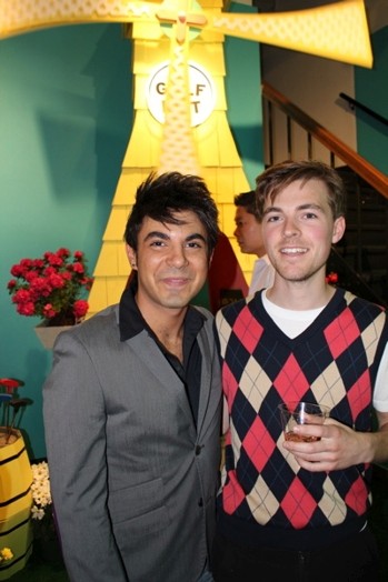 portrait of two men at an exhibition