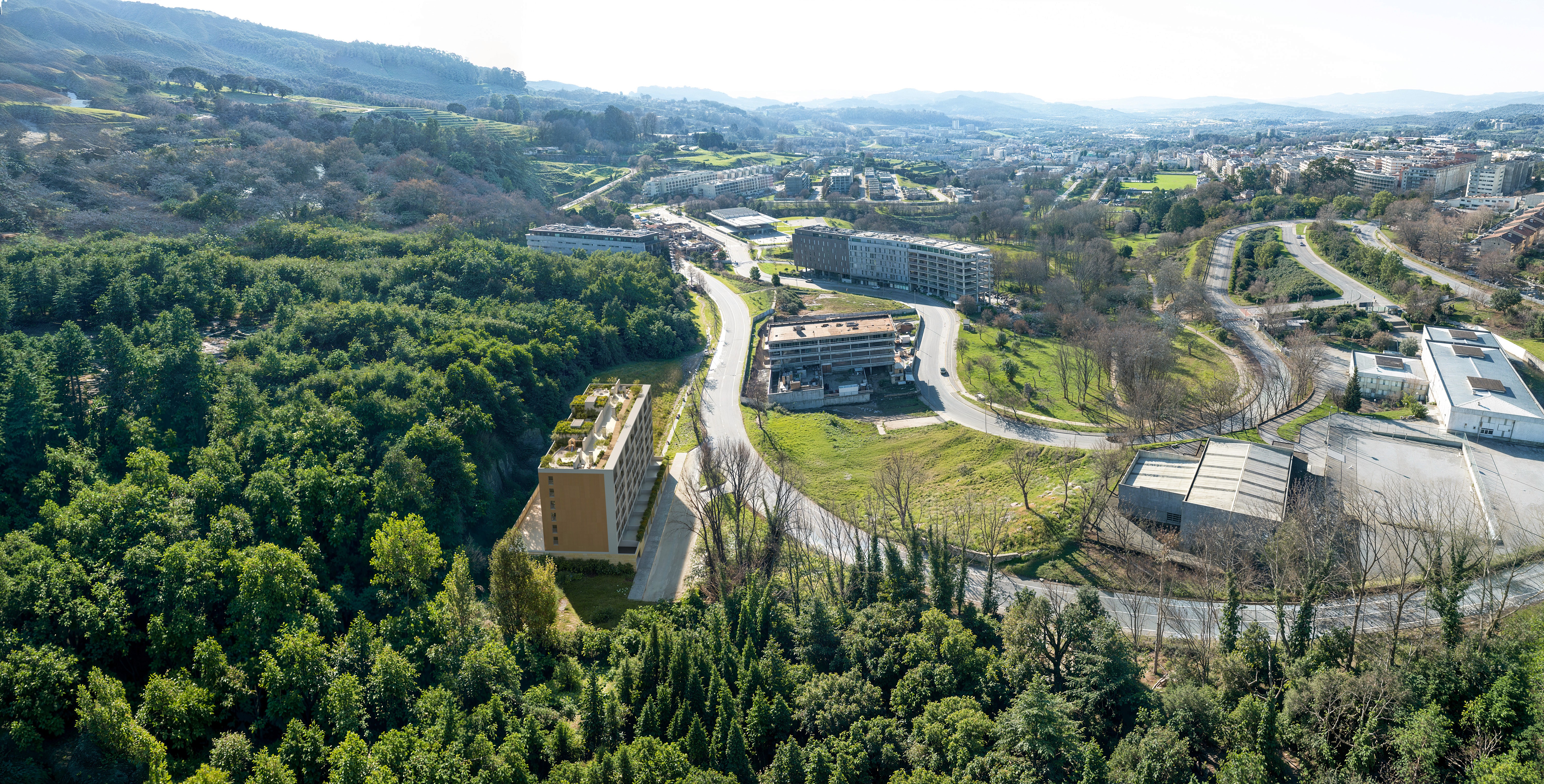 a castle with trees and grass in the foreground