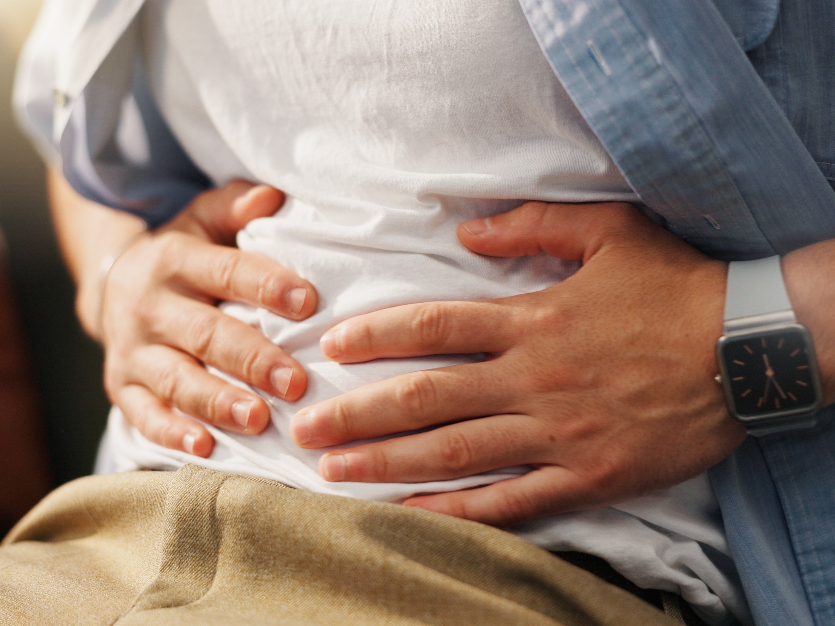 person with a painful stomach that might not be a candidate for other weight loss injections