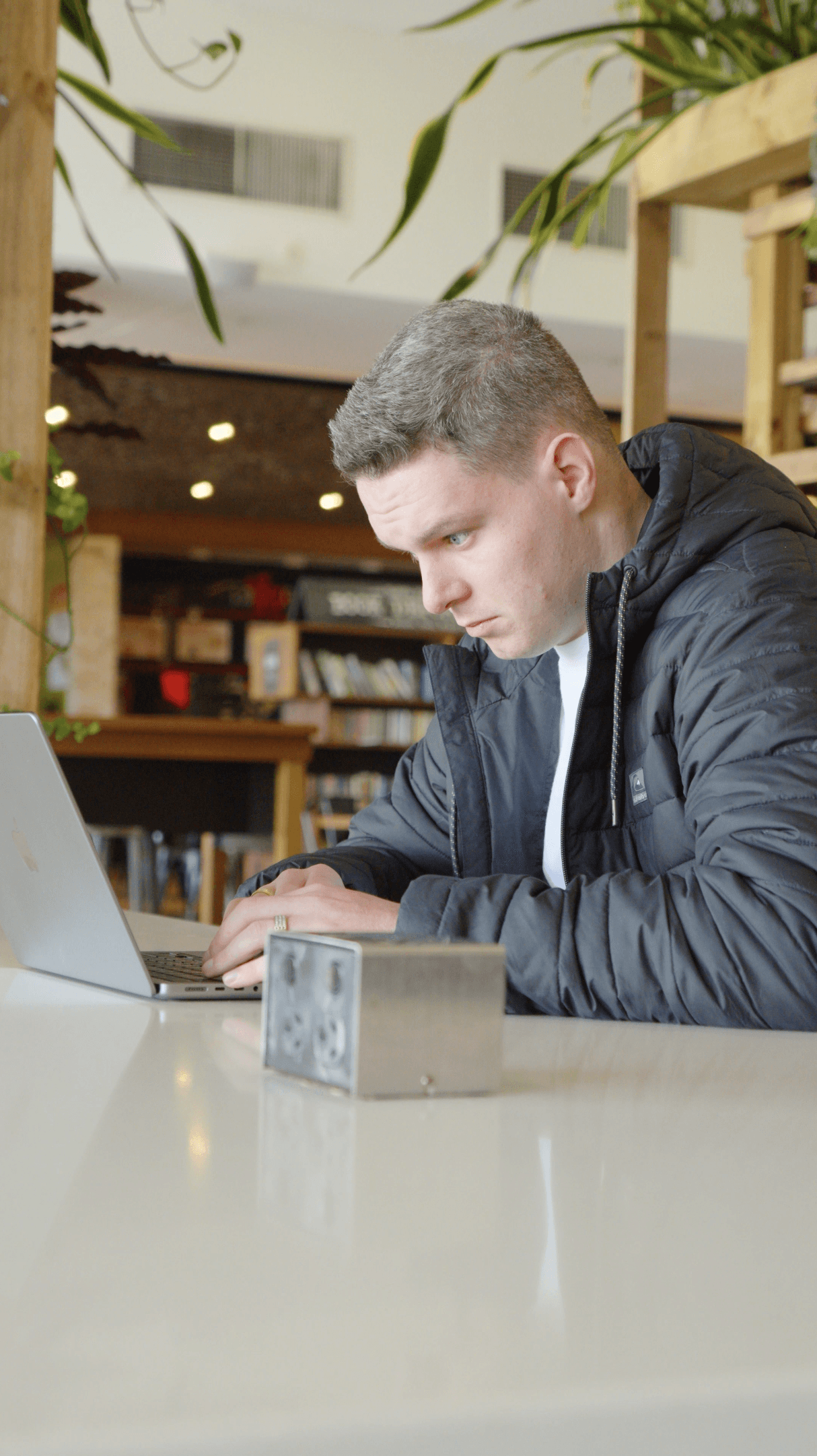 Image of Jacob Sutton on laptop