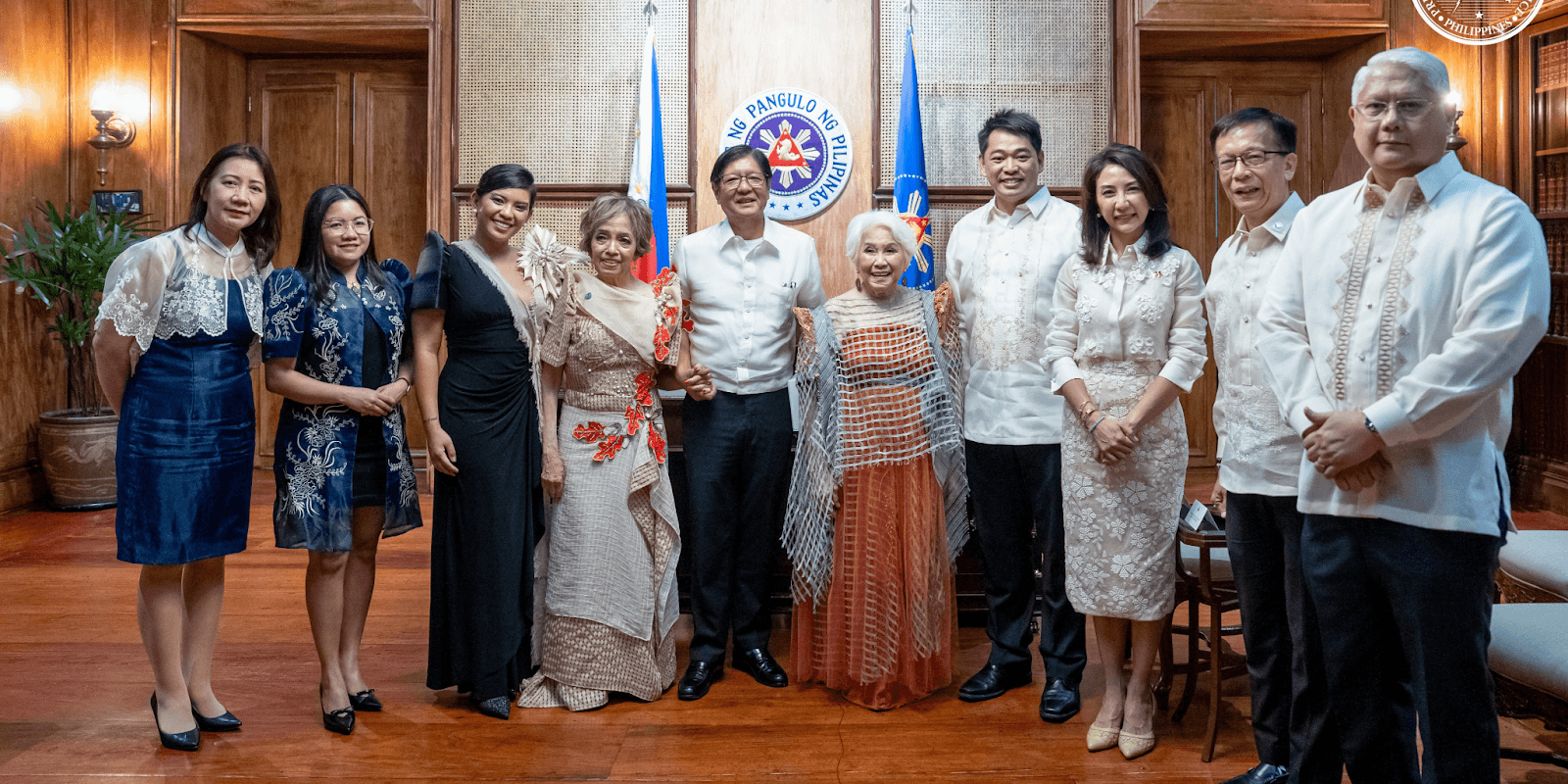 "Filipino World Travelers group at a travel event, showcasing a community committed to global exploration and Filipino pride."