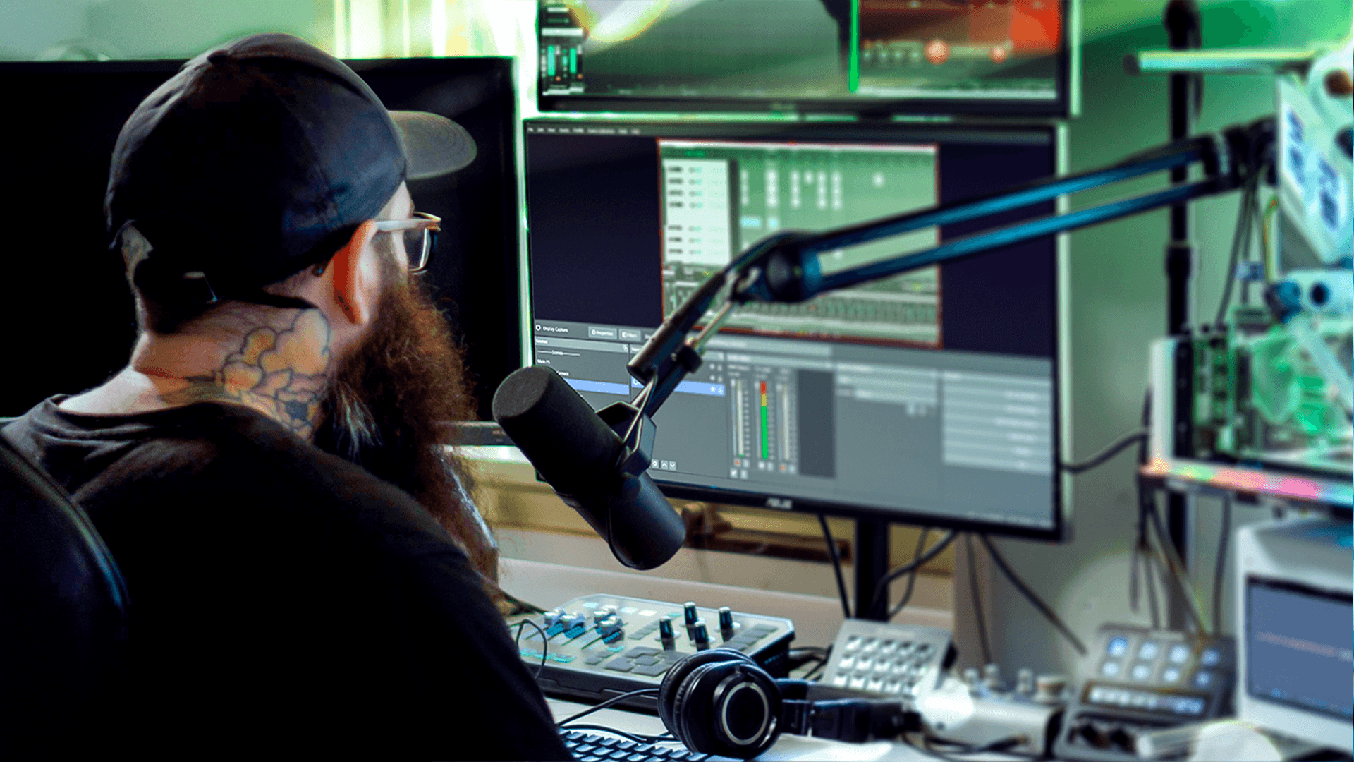 Advanced streaming desk with pro microphone, audio mixer, and dual-monitor setup for content creators.