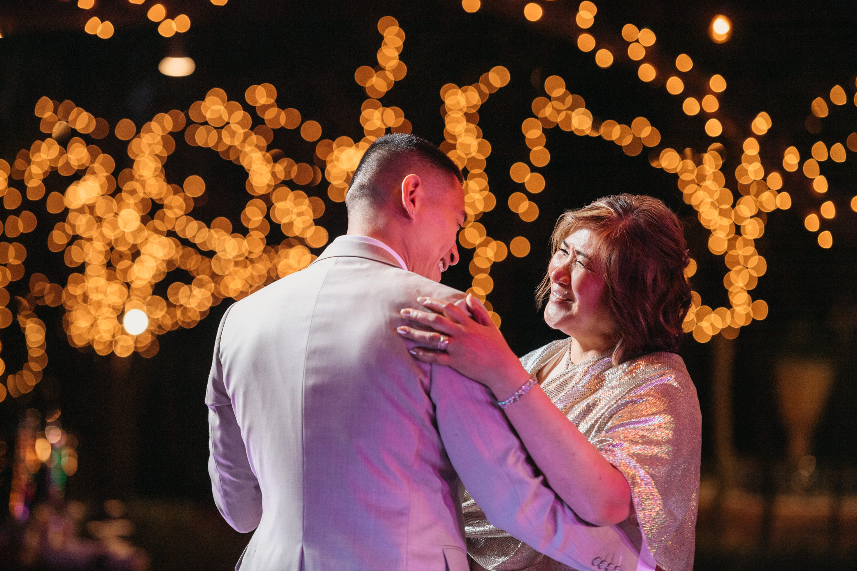High-energy dance floor photos at outdoor wedding reception