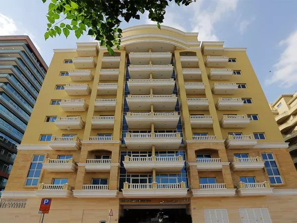 Spacious apartments with large balconies. Real estate agent services.