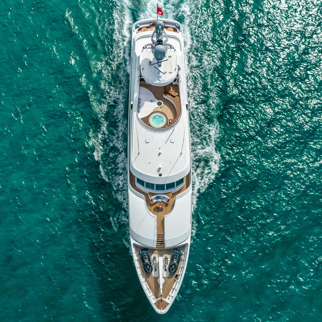 Motor Yacht Reverie Cruising Through the Blue Ocean