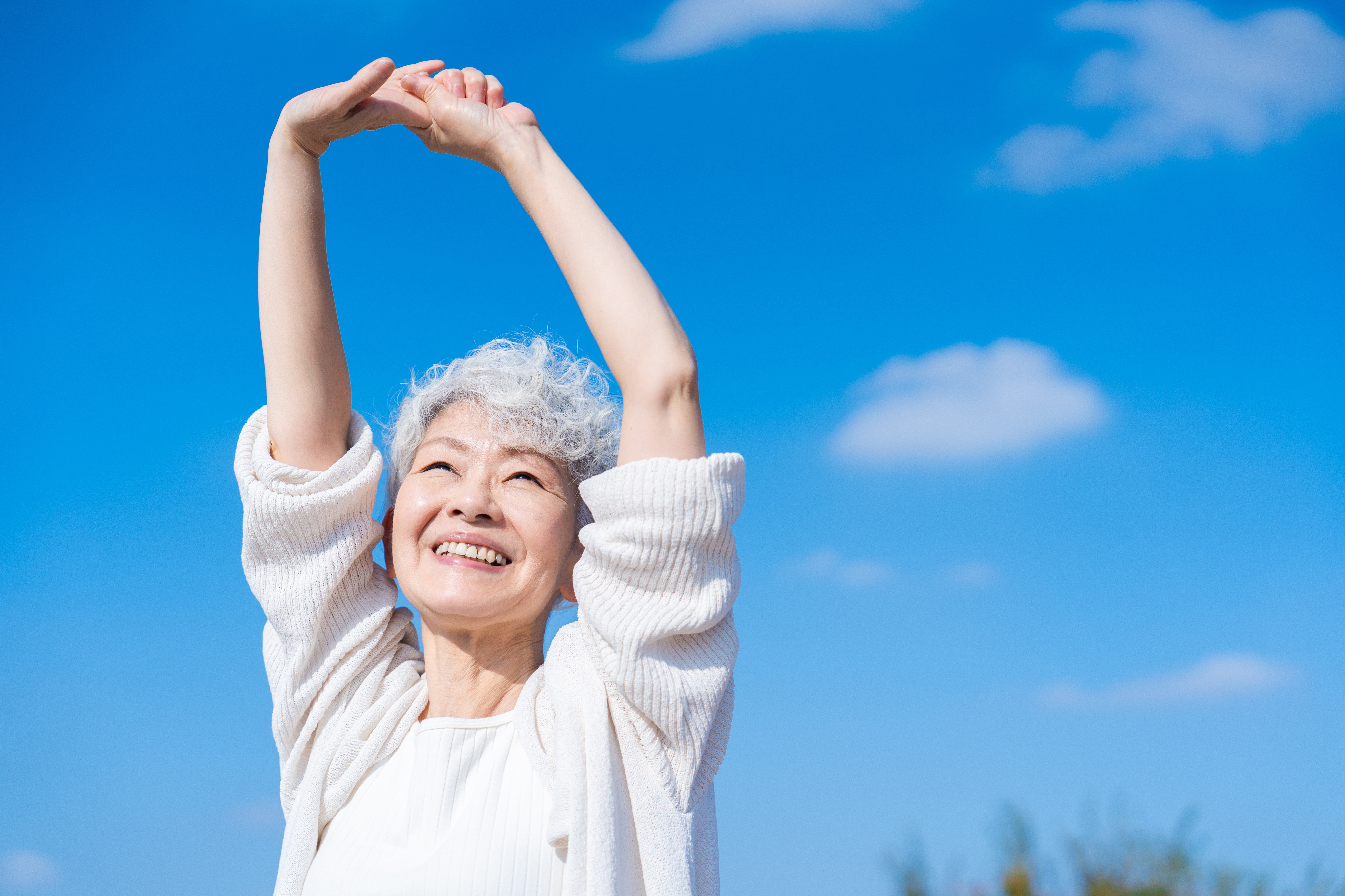 Woman enjoying a restorative moment outdoors