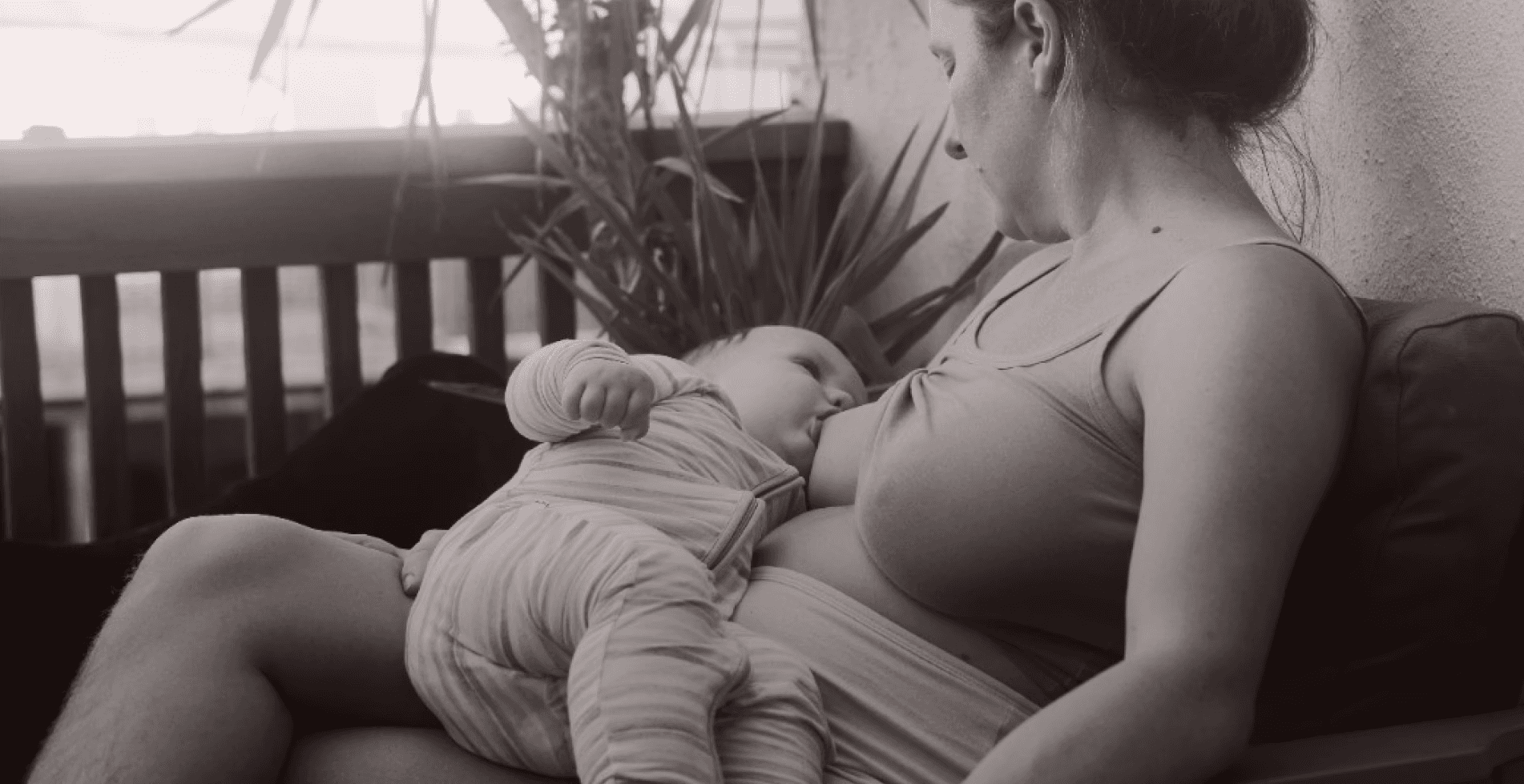 Mother breastfeeding baby