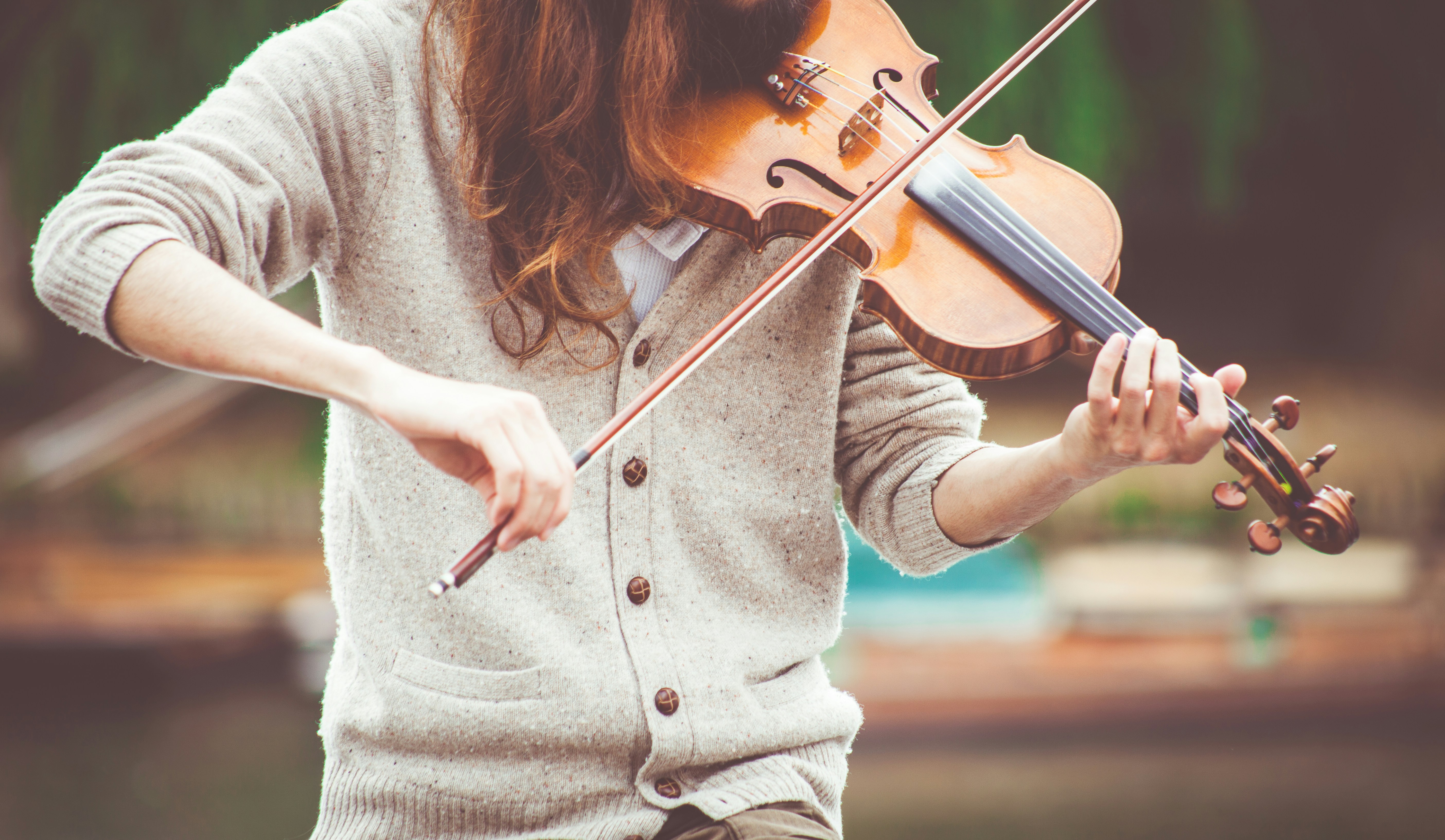 girl playing strings - musicfy