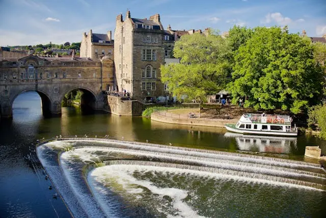 Photograph of Bath in Somerset. Showing the river and an old bridge.