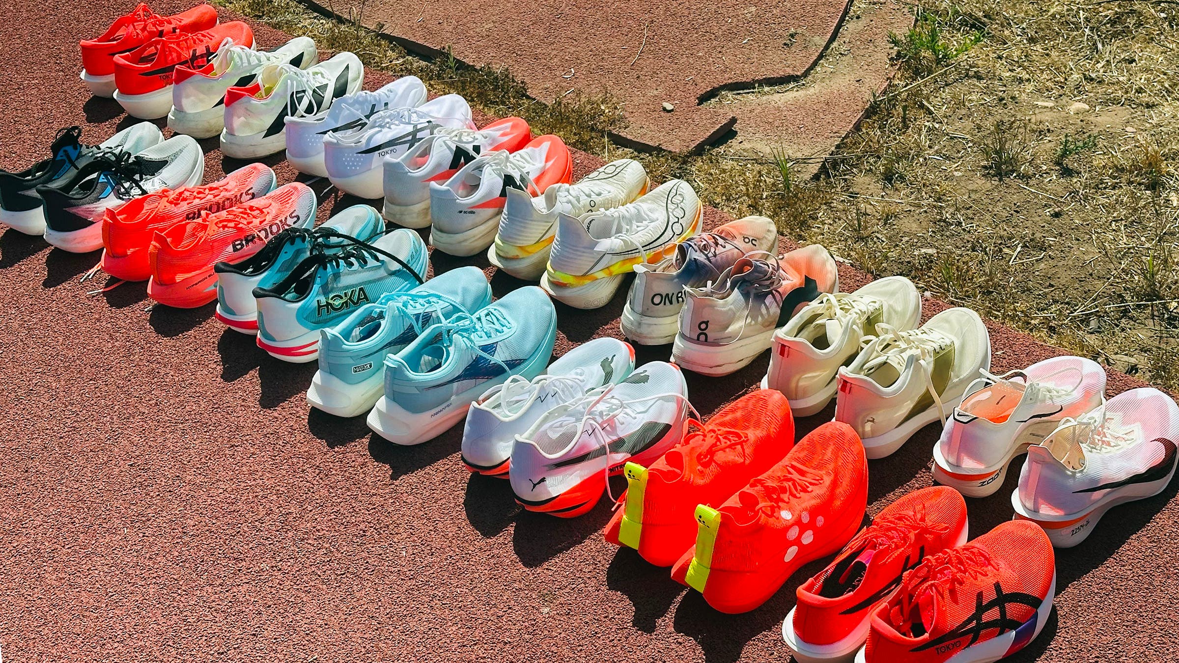 Lineup of super shoes on a track