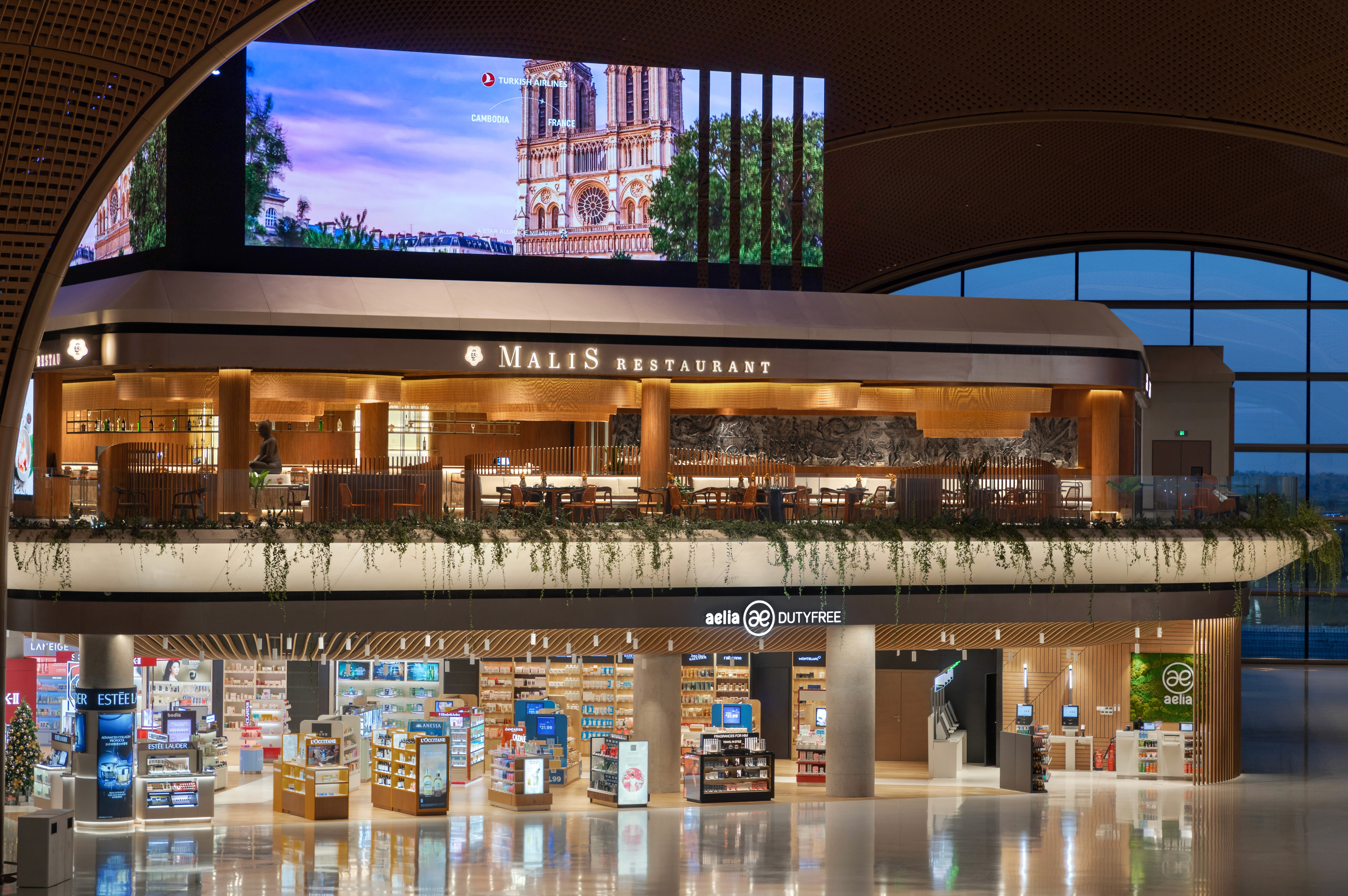 malis-restaurant-exterior-airport-view Exterior view of Malis Restaurant at Techo International Airport located above the Aelia Duty Free shop.