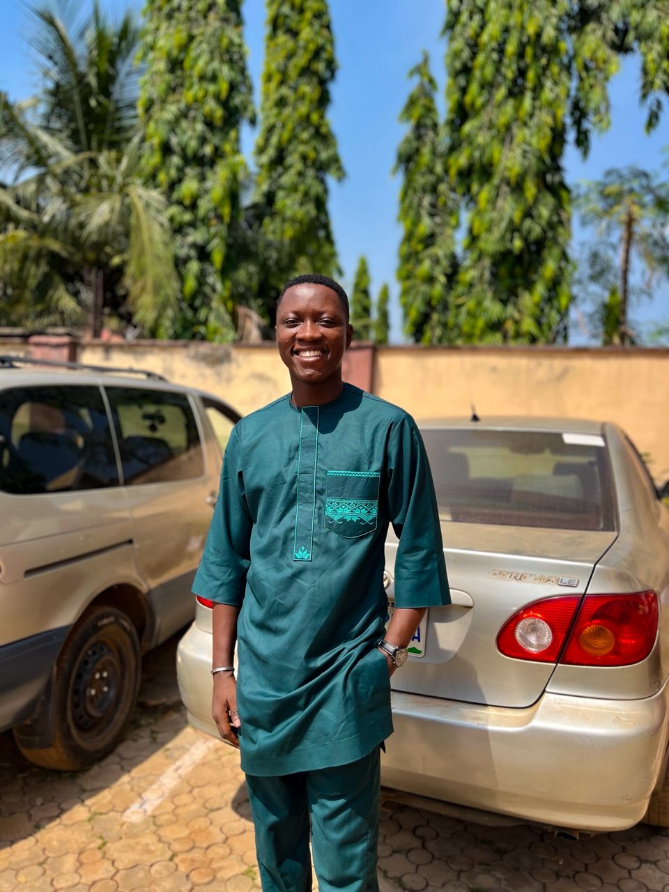 Man dressed in denim jacket pressing laptop