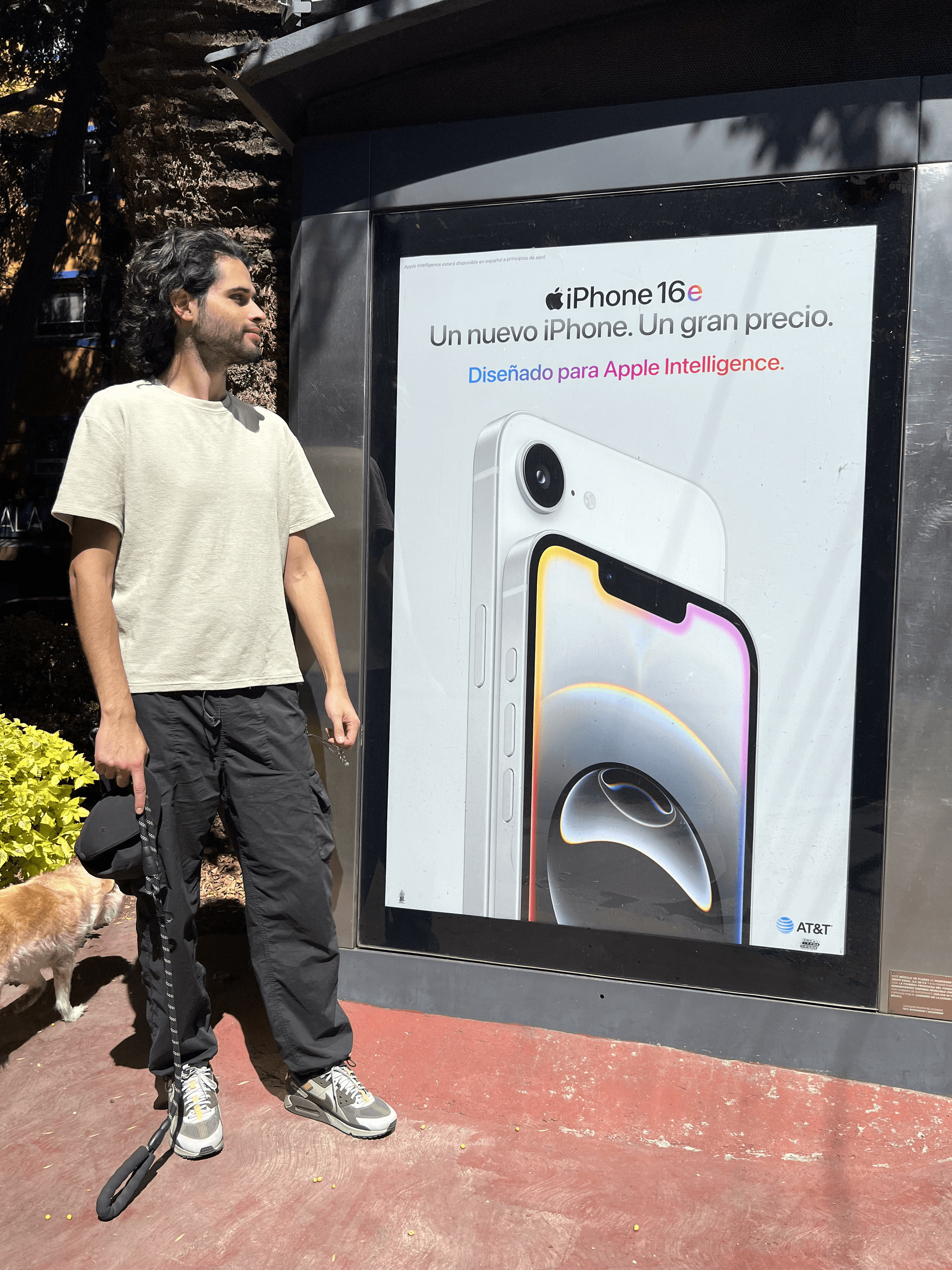 Close-up portrait of a woman with flawless skin wearing a wide-brimmed beige hat, her face softly framed by delicate shadows.