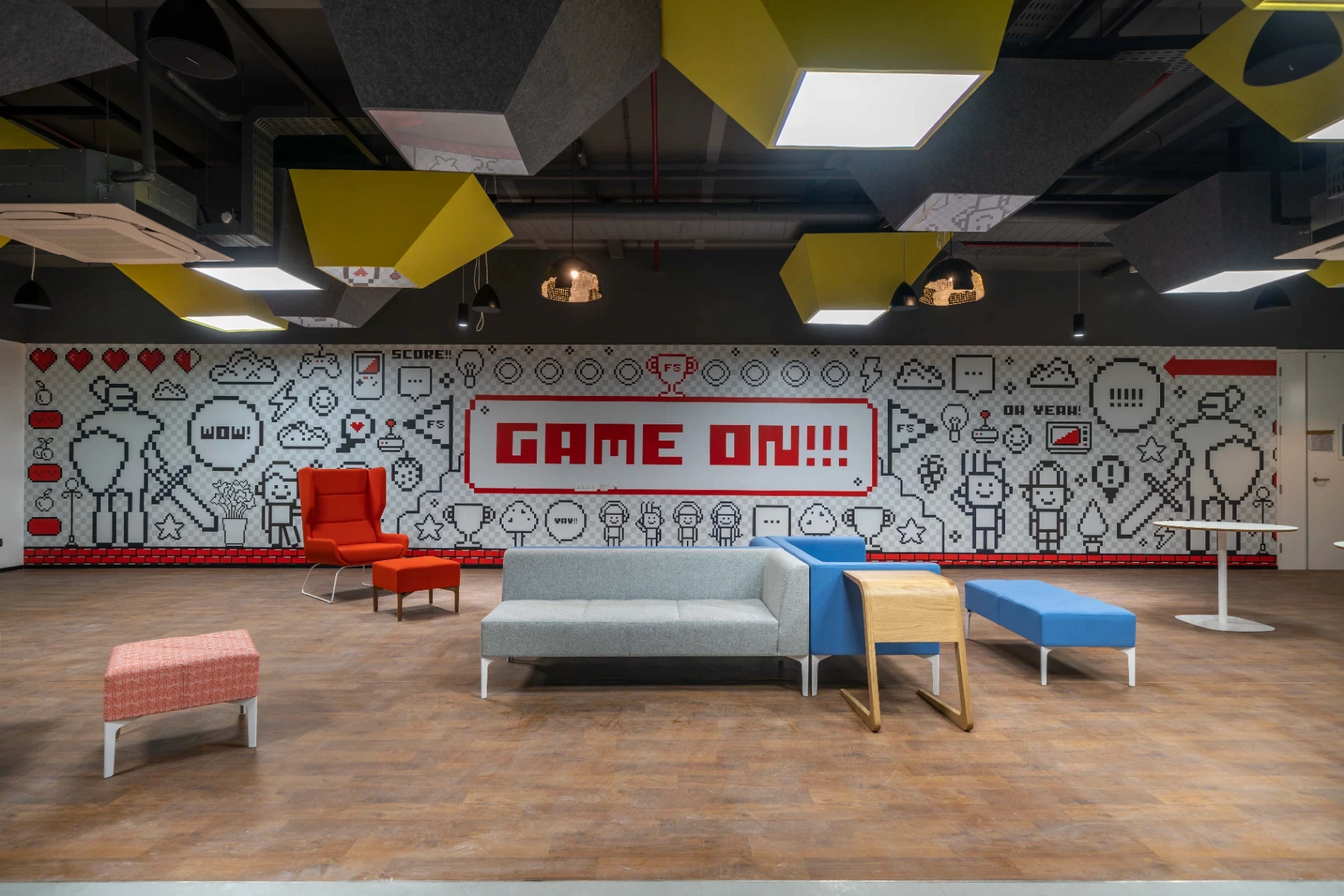 Contemporary workspace interior in Hyderabad with marble feature wall and collaborative seating, designed by Liquid Space Studio