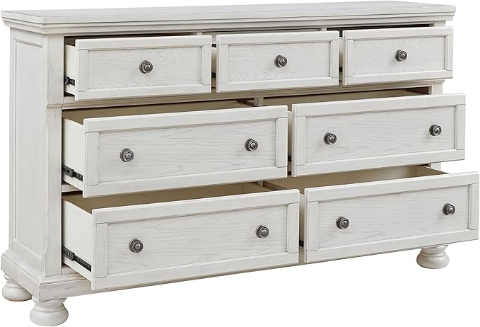 Elegant robbinsdale dresser with ample storage space and a timeless design.