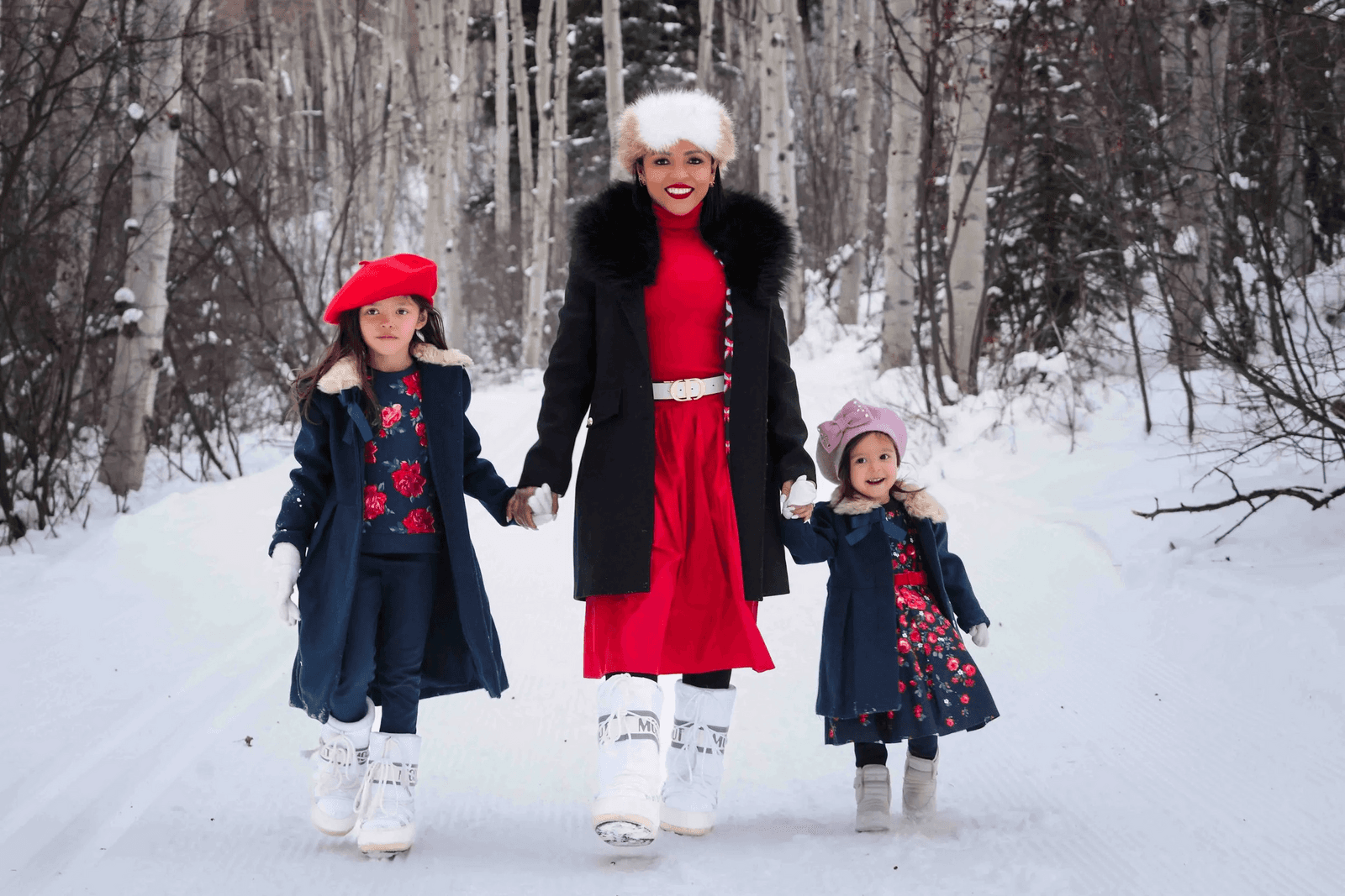 Family portrait in a snowy Aspen forest