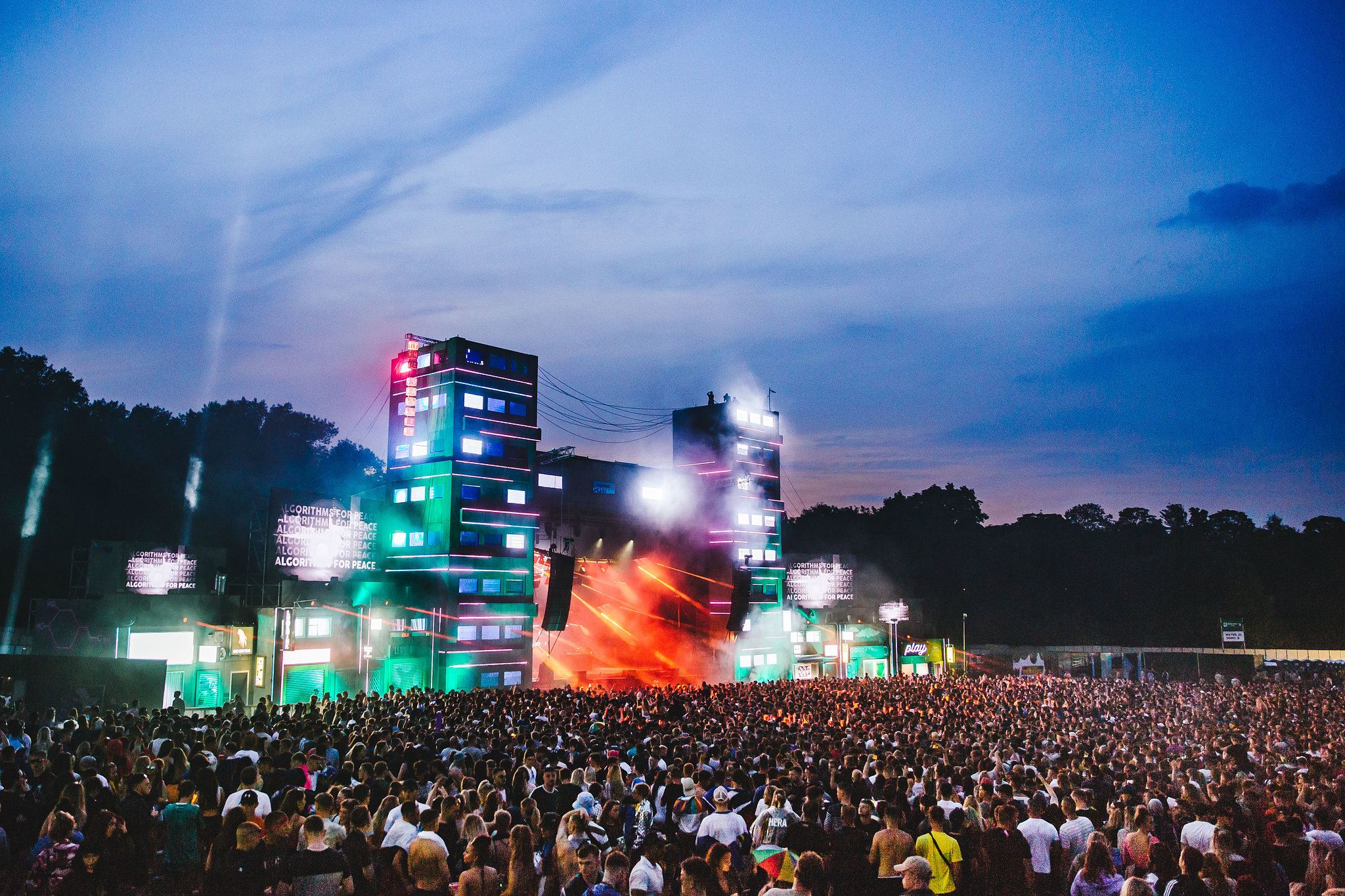 white Apple Magic mouse on brown table