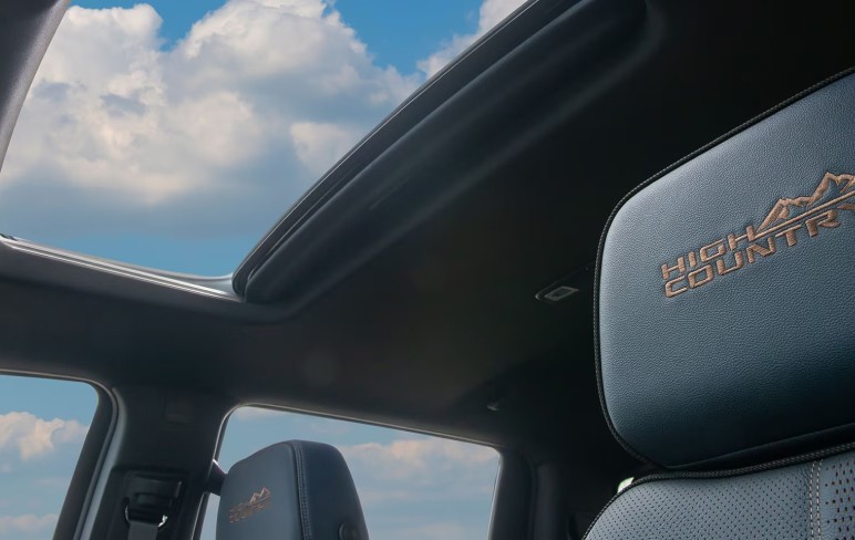 black car steering wheel during daytime