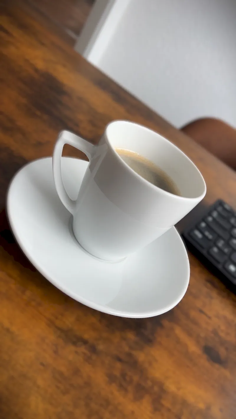 black flat screen tv on brown wooden table