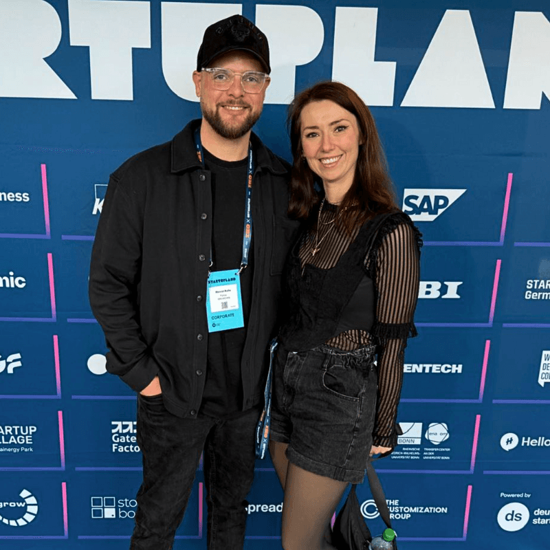 Group Taking a Selfie at a Concert Venue