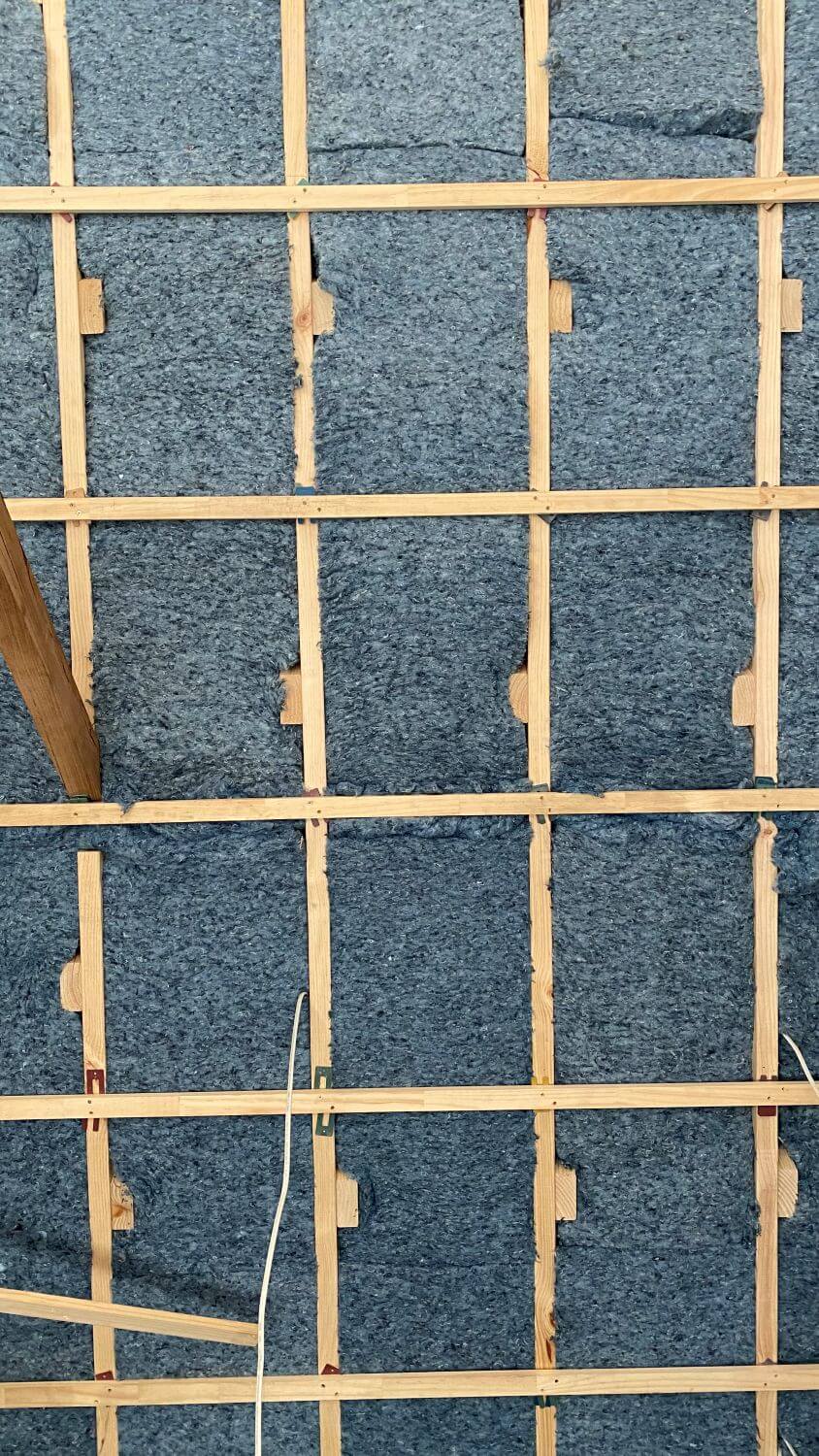 Denim installation used in a ceiling area in a Respirabuilt project