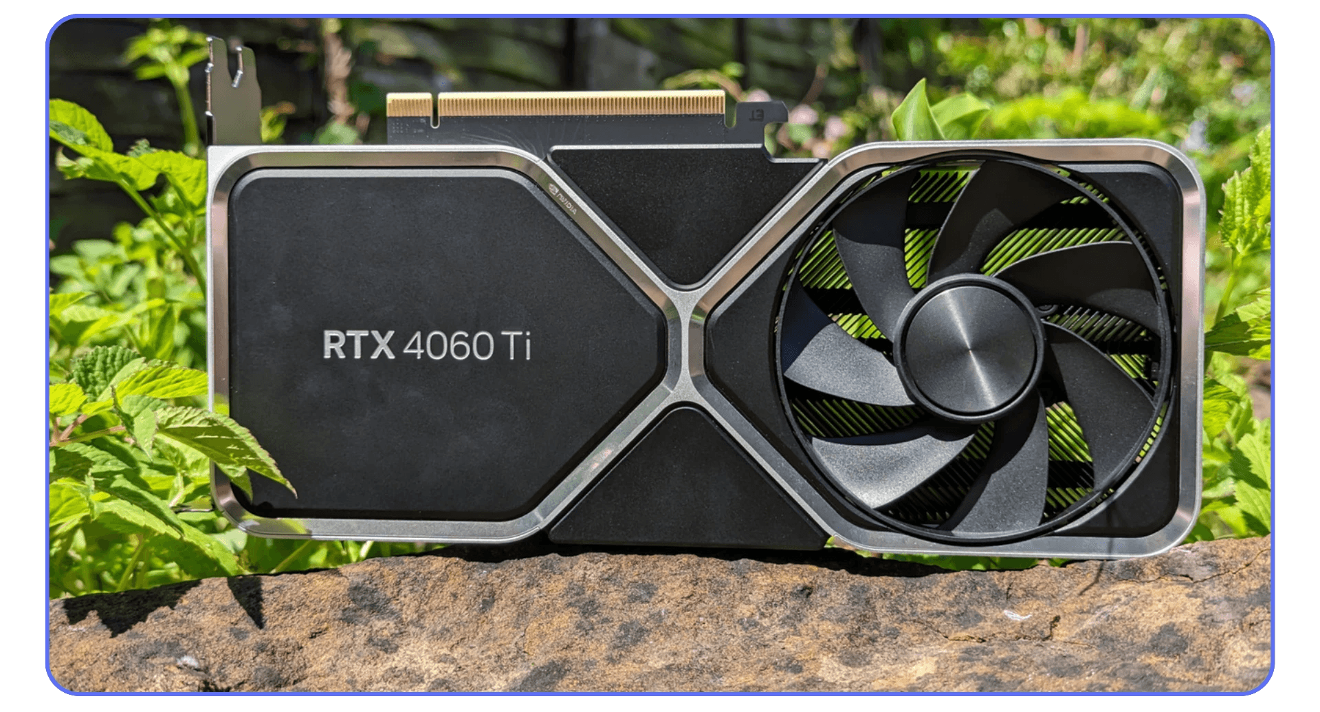 NVIDIA GeForce RTX 4060 Ti graphics card on a stone surface, representing an affordable GPU for 1080p and 4K editing in Premiere Pro.