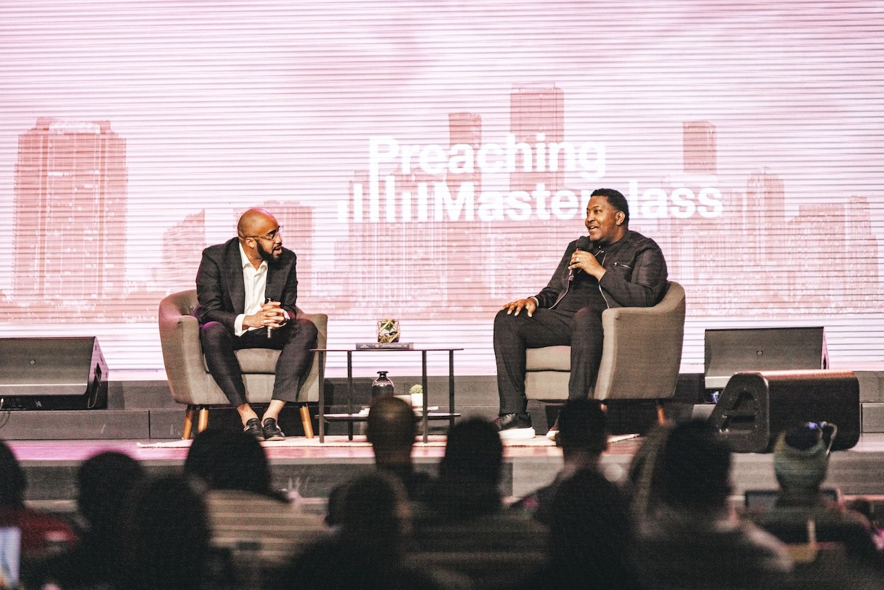People sitting and listening to a speaker