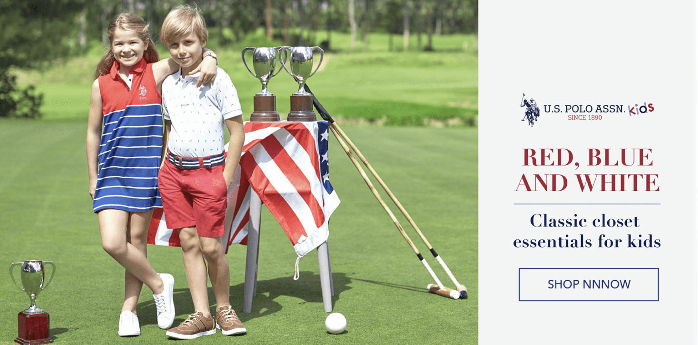 People playing soccer on a rooftop court surrounded by city buildings