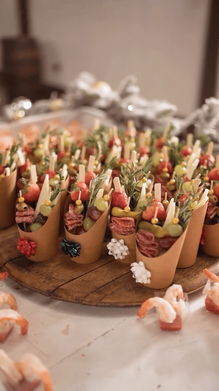 The wedding backdrop is the open sea, shimmering under late afternoon light