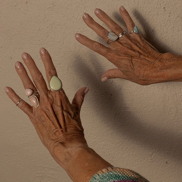 pair of hands with rings