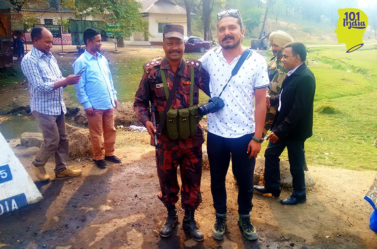 With the Bangladeshi border security force officer. His Indian counterpart in the background
