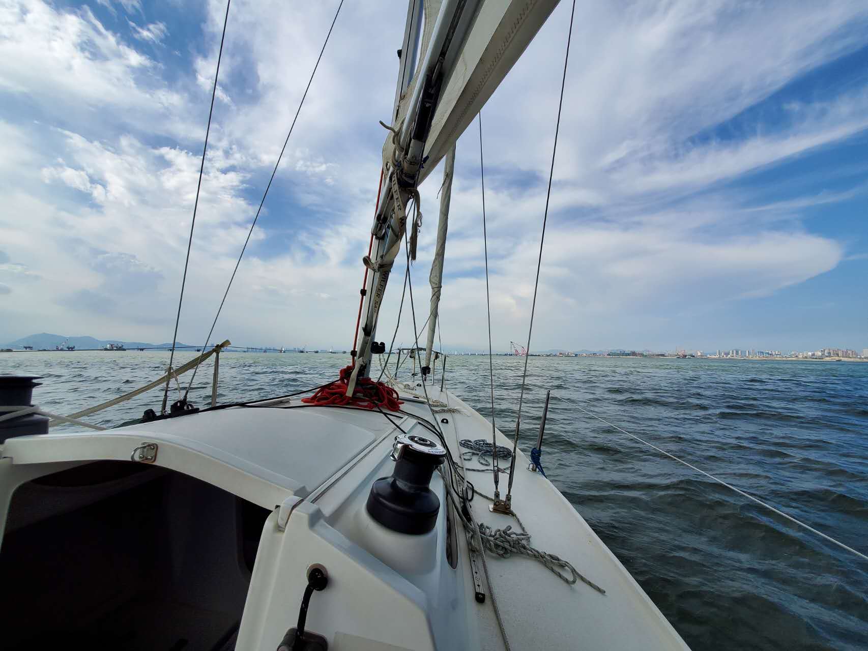 black laptop computer on brown wooden table