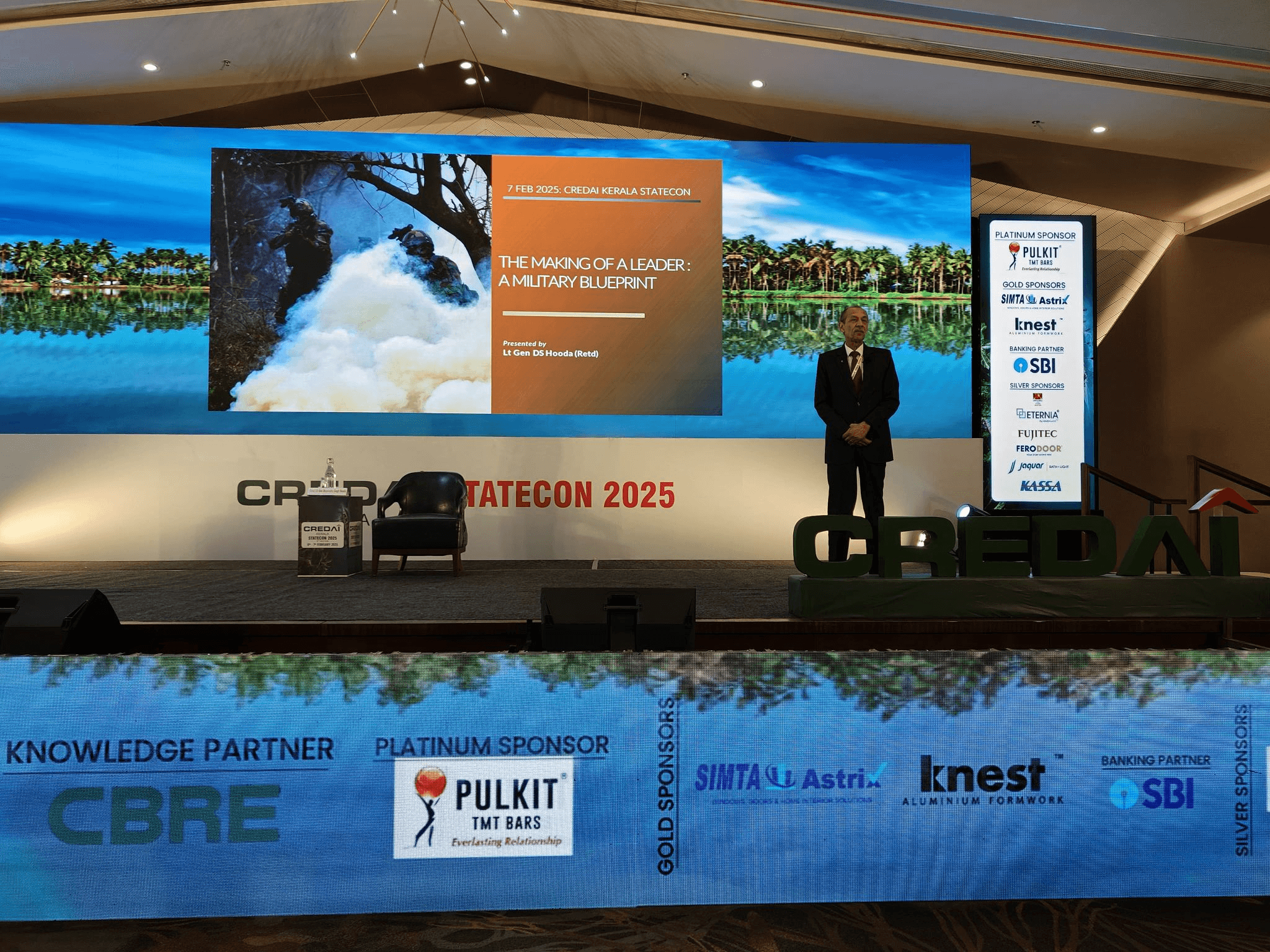 black quadcopter drone flying over snow field during daytime