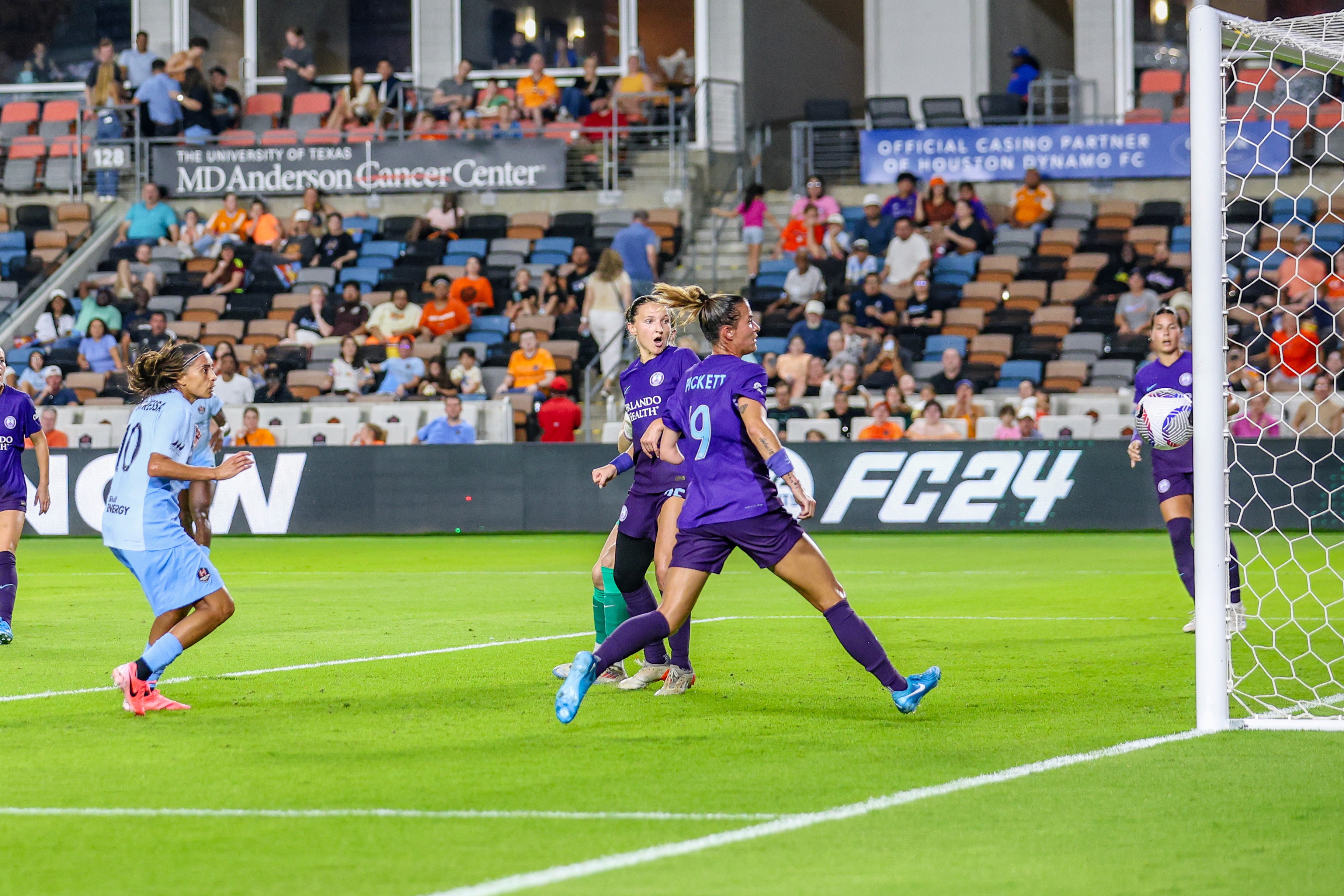 Kerry Abello (25) and Carson Pickett (19) of the Orlando Pride watch as Houston Dash's Andressa Avelo's (10) hits the post during an NWSL game between the Houston Dash and the Orlando Pride at Shell Energy Stadium on August 23, 2024 in Houston. The match would finish 1-0 in favor of Orlando. (Photo by Parker George/Undrafted)