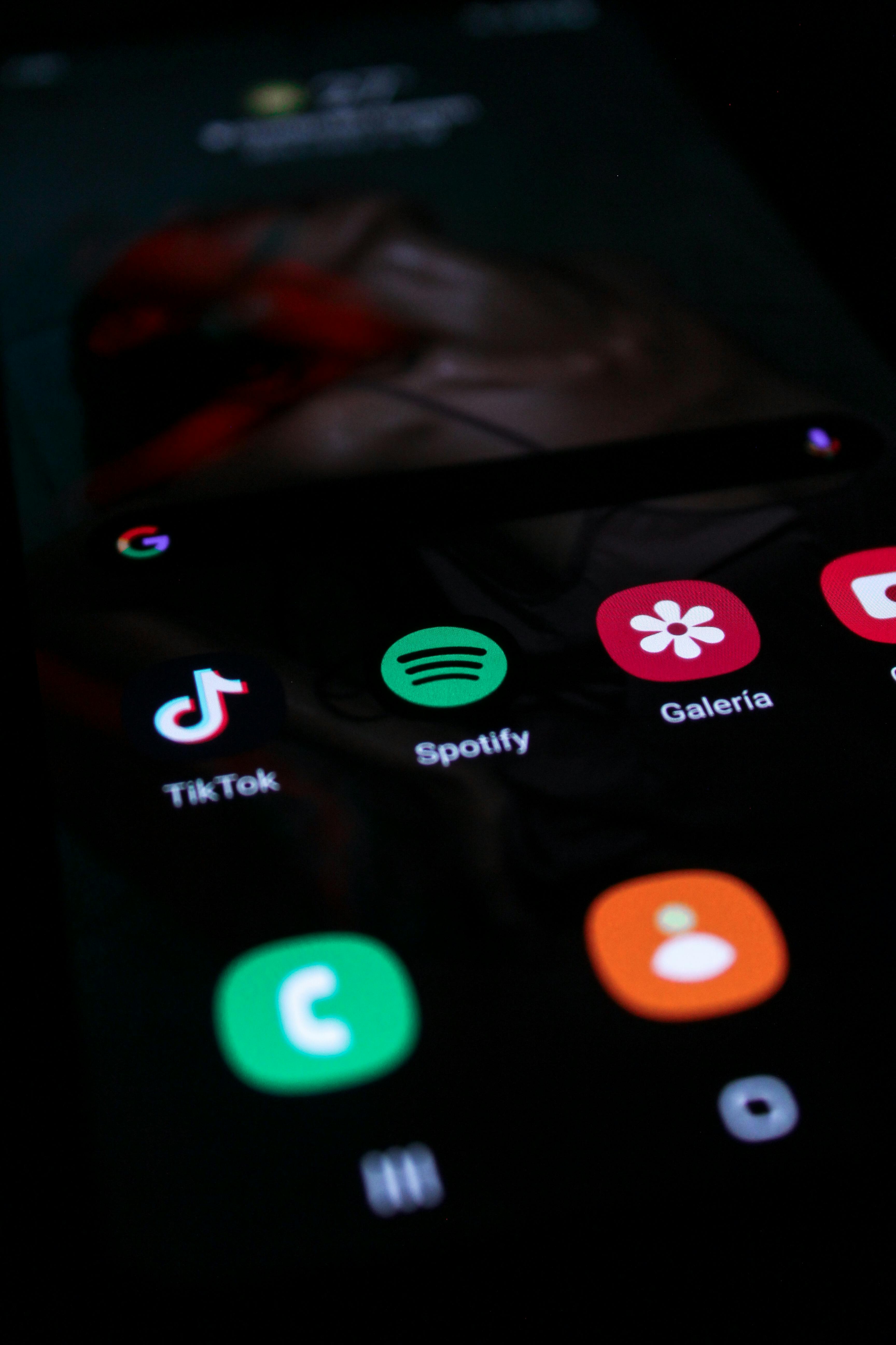 Close Up Shot of a Smartphone showing the spotify app