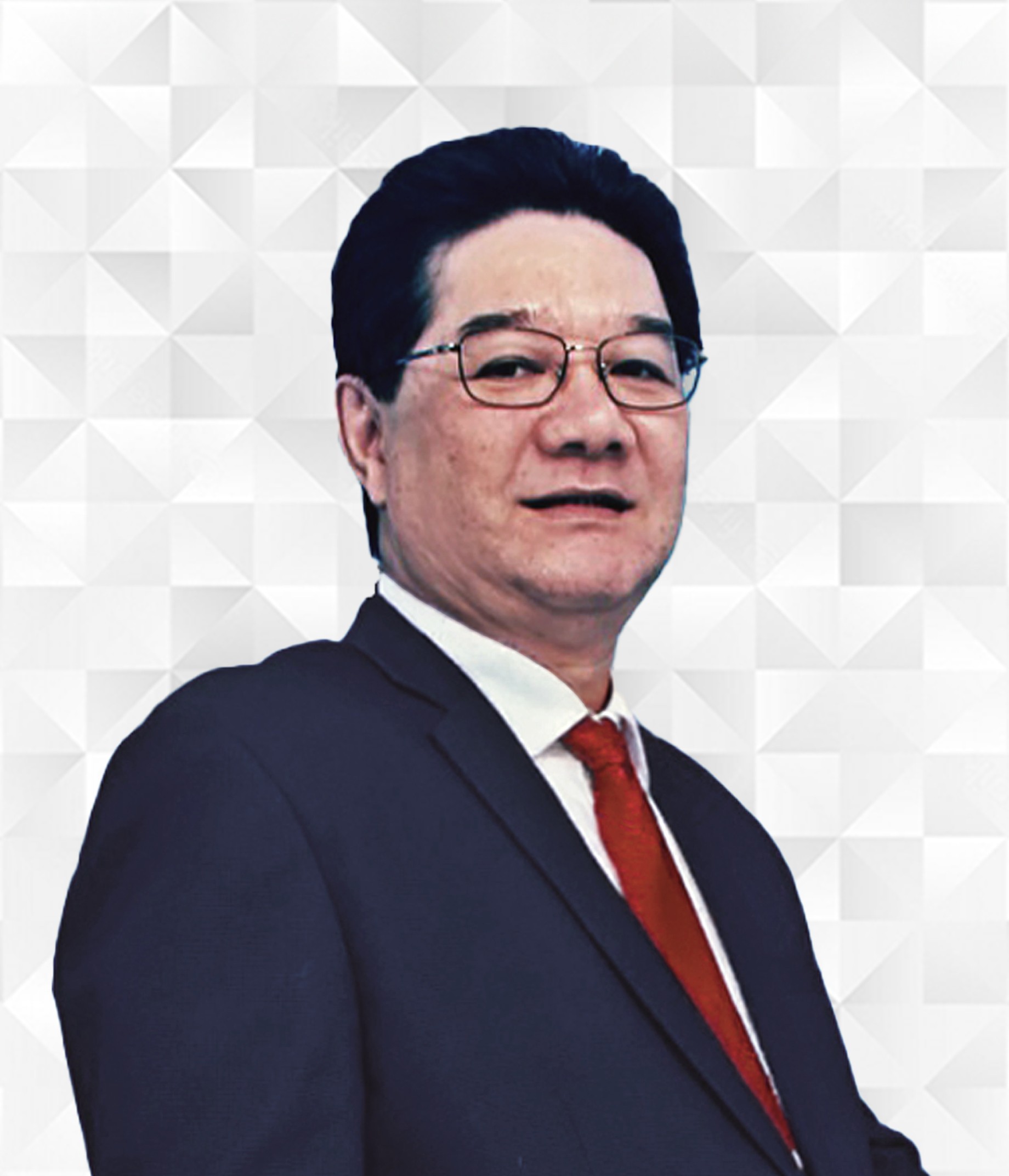 Foto portrait Direktur Product & Delivery collega Royke Dwipura menggunakan jas biru dan dasi berwarna merah