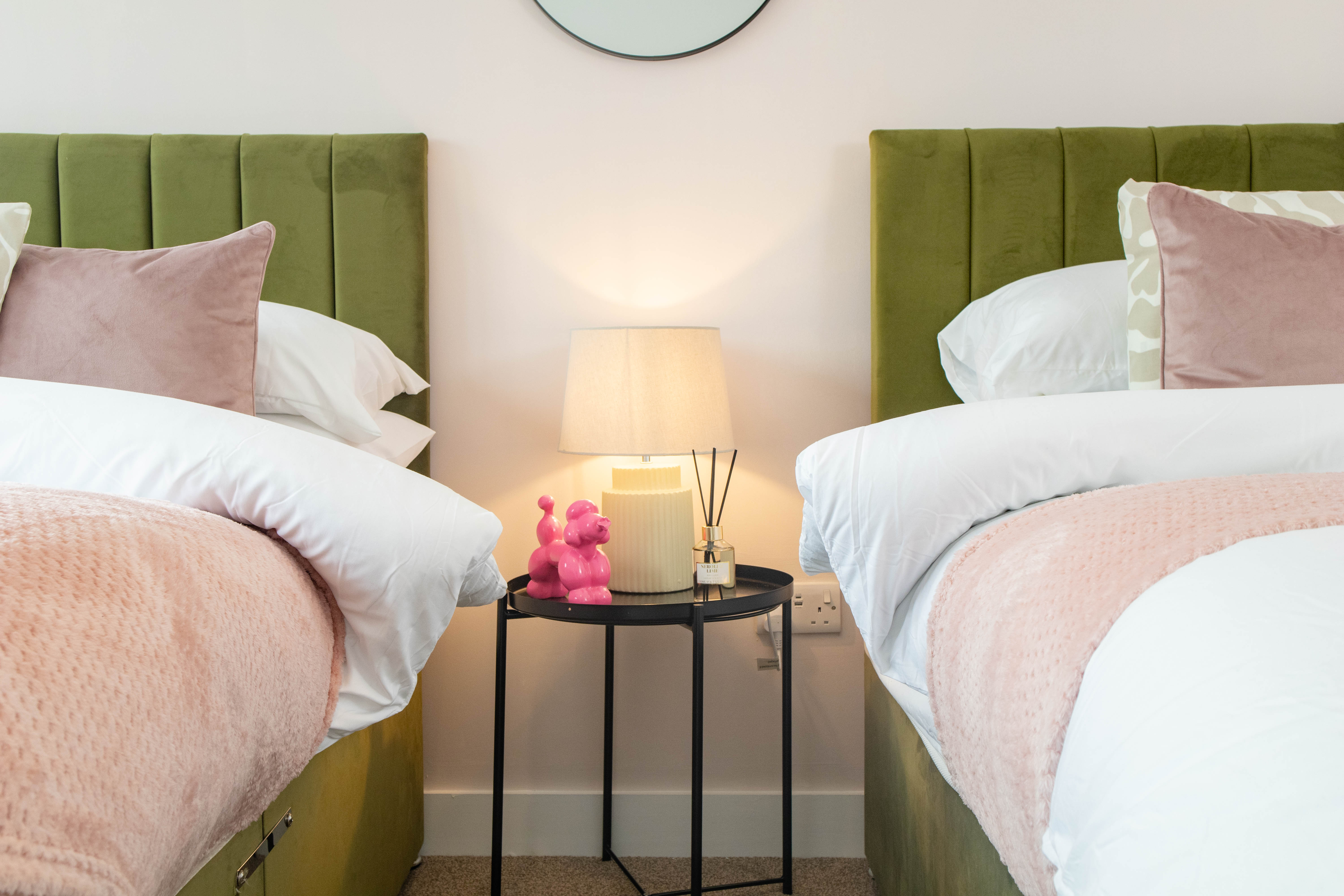 Beautiful minimalist dining area with grey dining set and artwork on walls