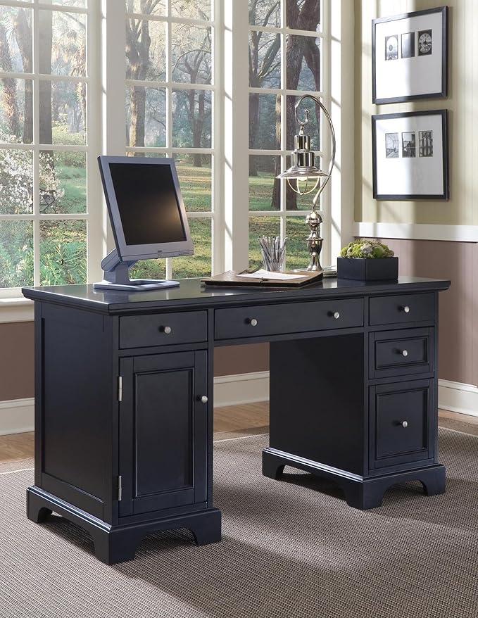 The pedestal desk offers a sleek and contemporary look, ideal for productivity.